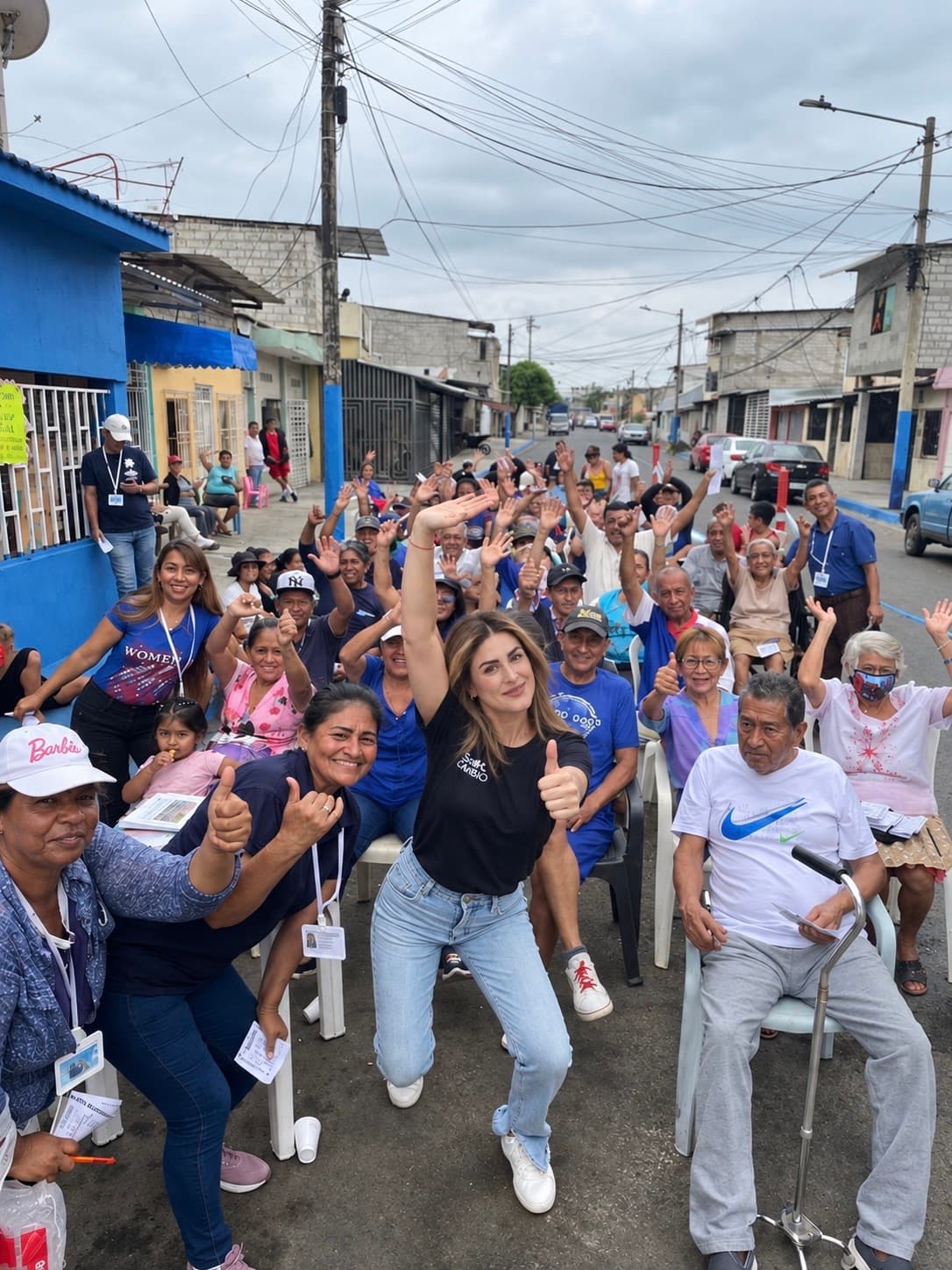 Amy with community members